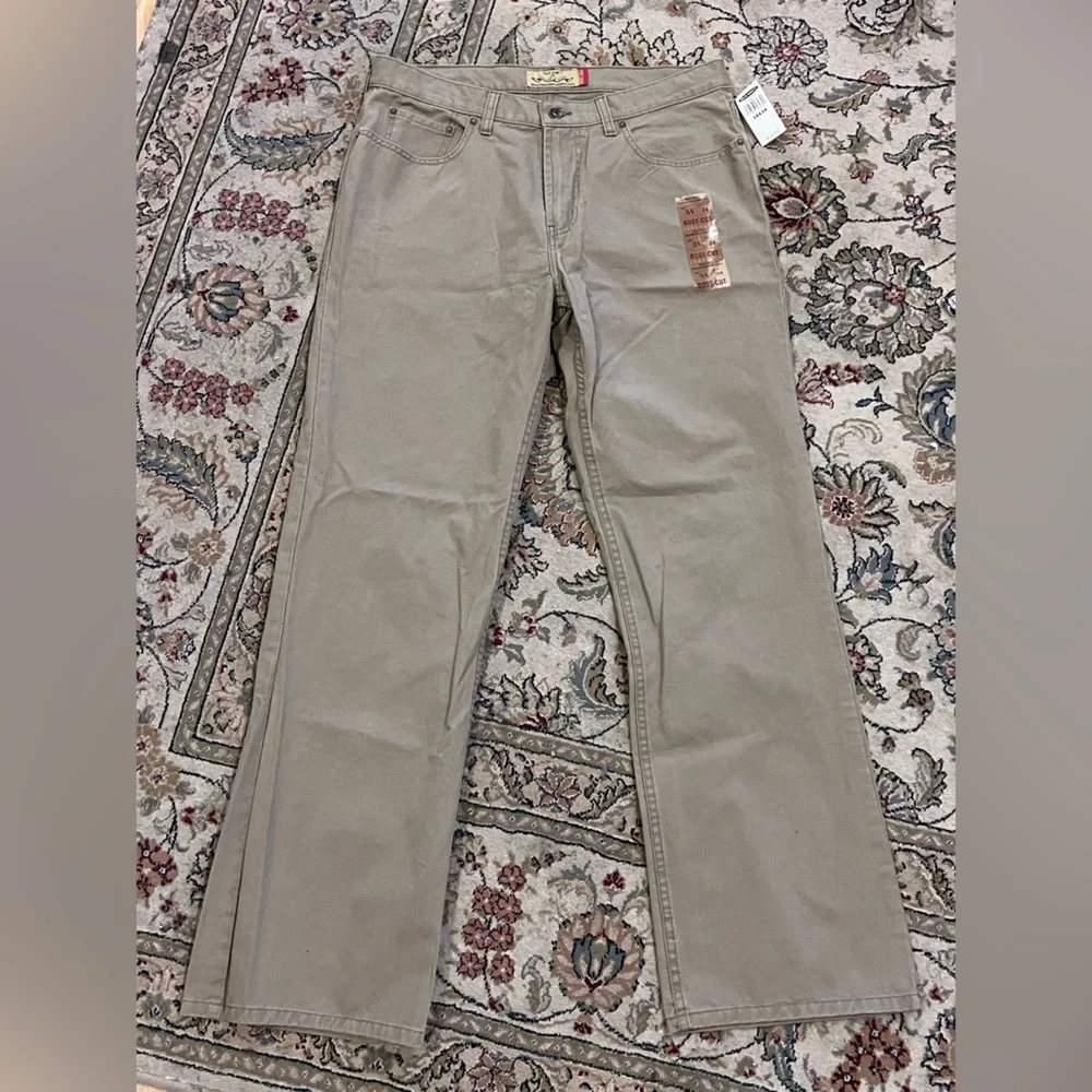 Men's size 34x34- OLD navy bootcut beige pants- new with tags